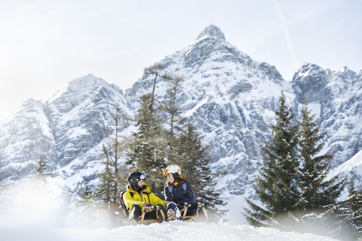 [Translate to Englisch:] Rodeln im winterlichen Stubaital